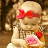 Маленькая девочка с цветком